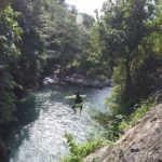 Cliff jump of Pucuk Waterfall